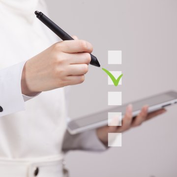 truthfinder cost background check service man checking on tablet